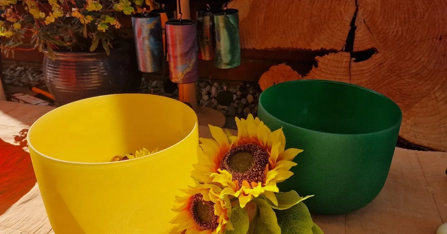 Yellow and green bowls with sunflowers.